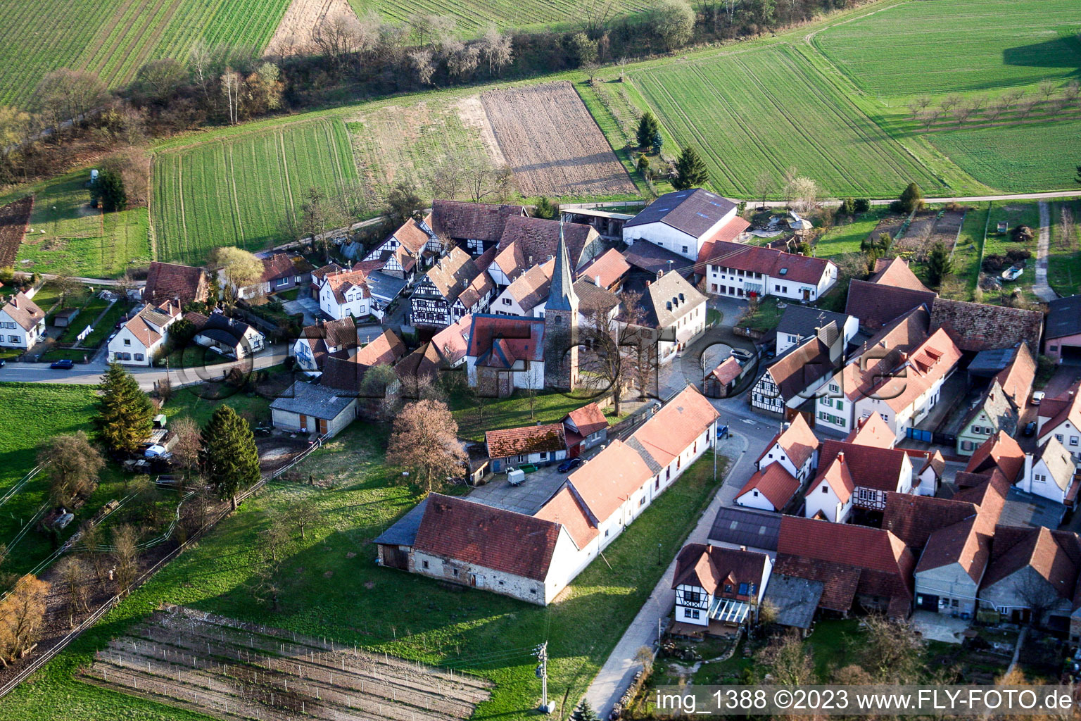 Aerial photograpy of Village - view on the edge of agricultural fields and farmland in the district Klingen in Heuchelheim-Klingen in the state Rhineland-Palatinate
