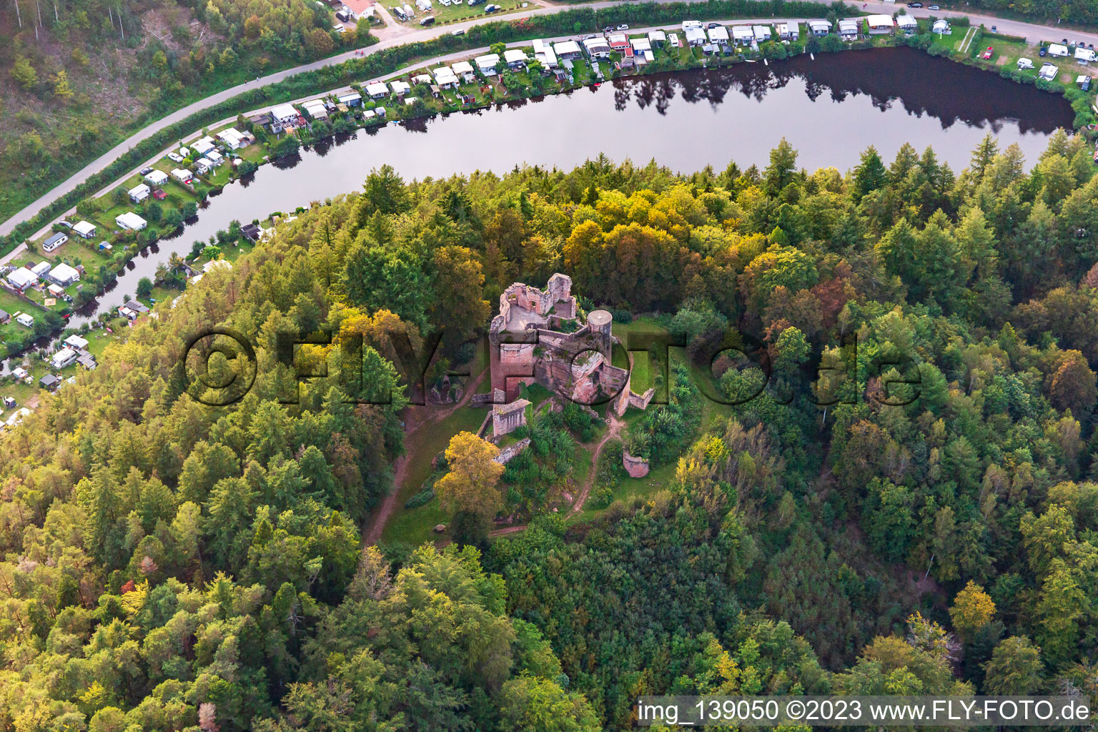 Aerial photograpy of Neudahn castle ruins above the Neudahner Weiher campsite in Dahn in the state Rhineland-Palatinate, Germany