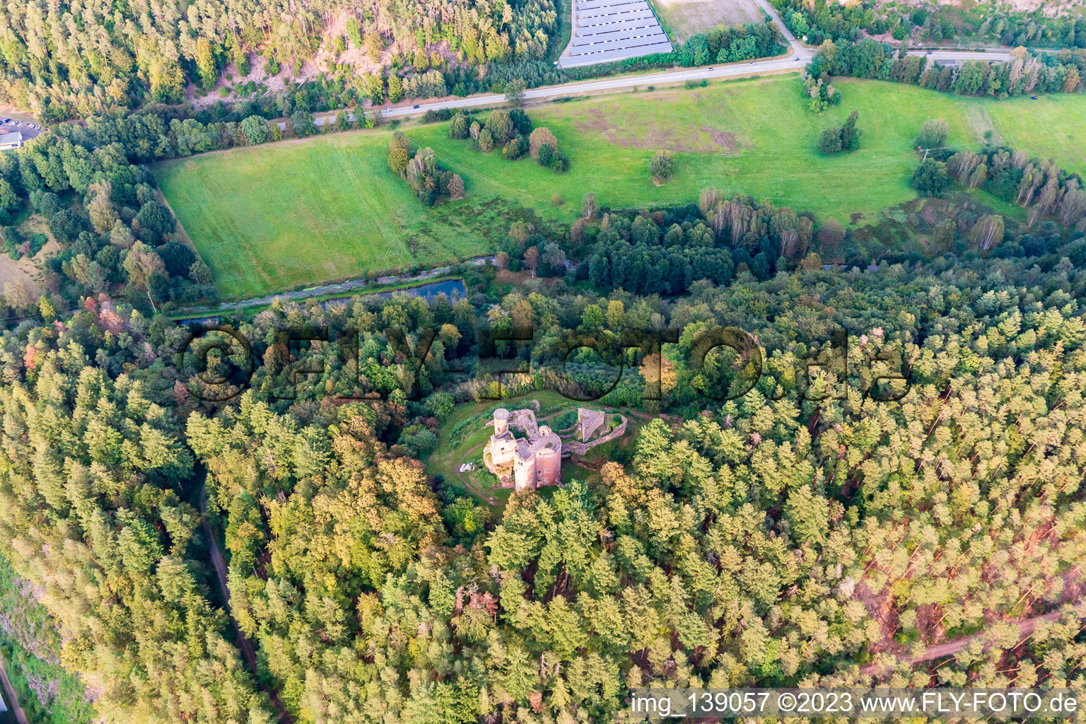 Neudahn Castle ruins above the Neudahner Weiher campsite in Dahn in the state Rhineland-Palatinate, Germany seen from above