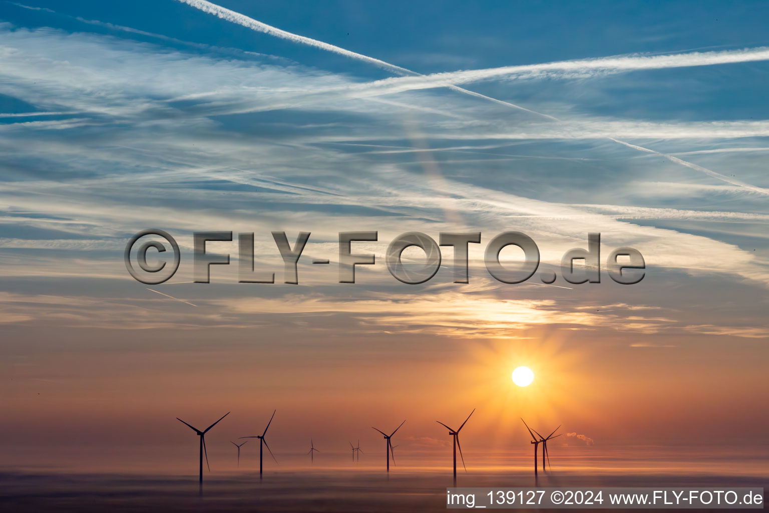 Freckenfeld wind farm at sunrise in Dierbach in the state Rhineland-Palatinate, Germany