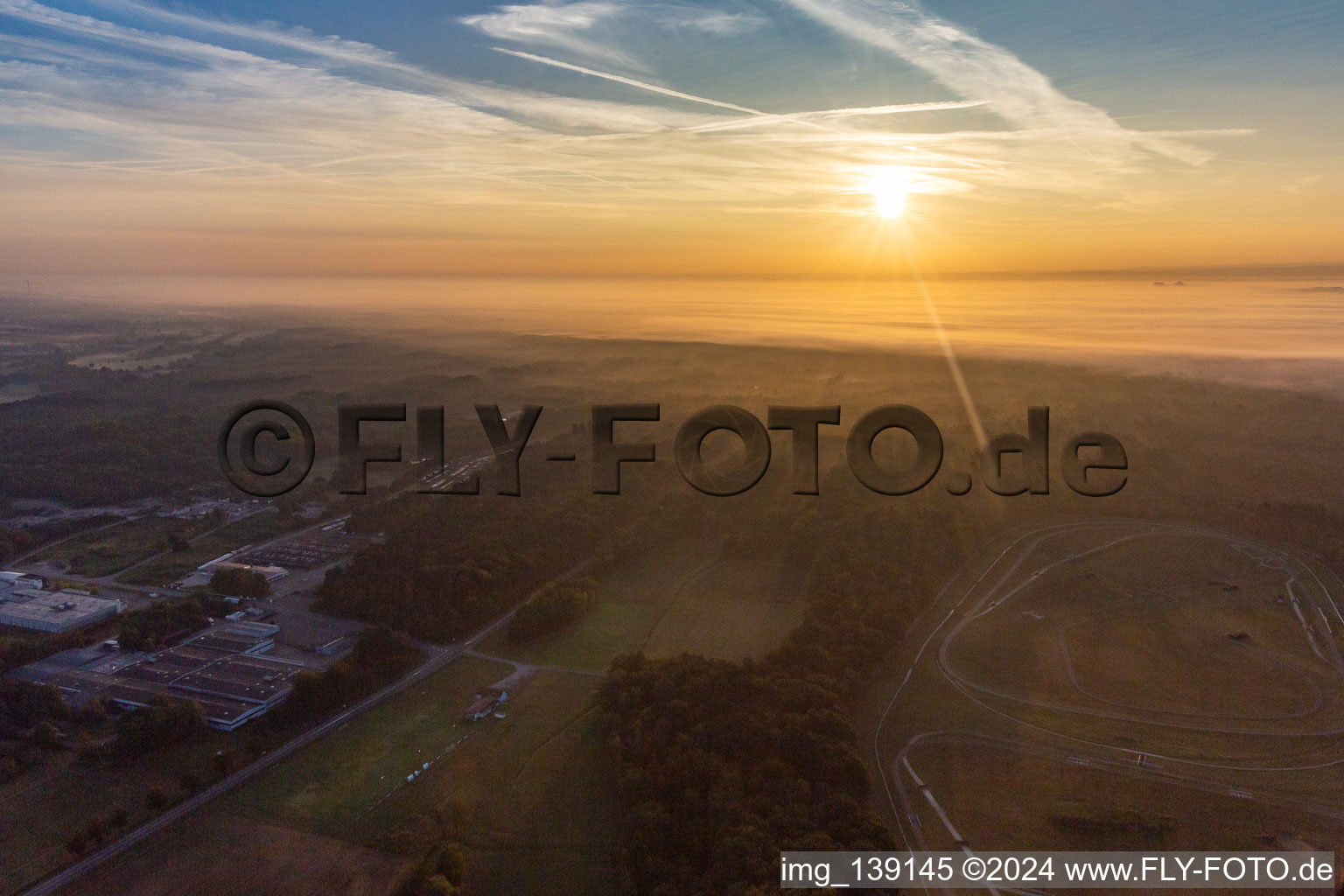 Hippodrome de la hardt at sunrise in the mist in the district Altenstadt in Wissembourg in the state Bas-Rhin, France