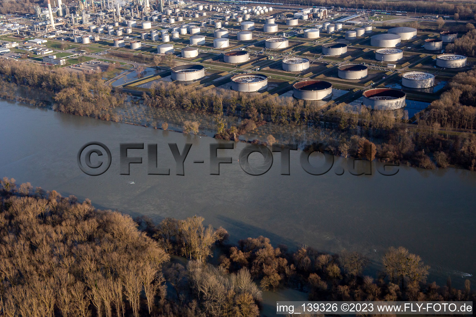 Aerial view of Flooding of the MiRO Karlsruhe tank farm during the Rhine flood in the district Knielingen in Karlsruhe in the state Baden-Wuerttemberg, Germany