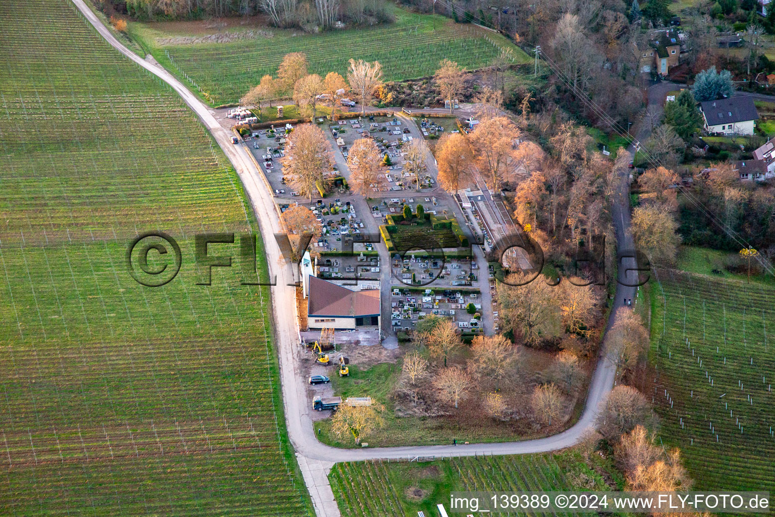 Cemetery at sunset in winter in Klingenmünster in the state Rhineland-Palatinate, Germany