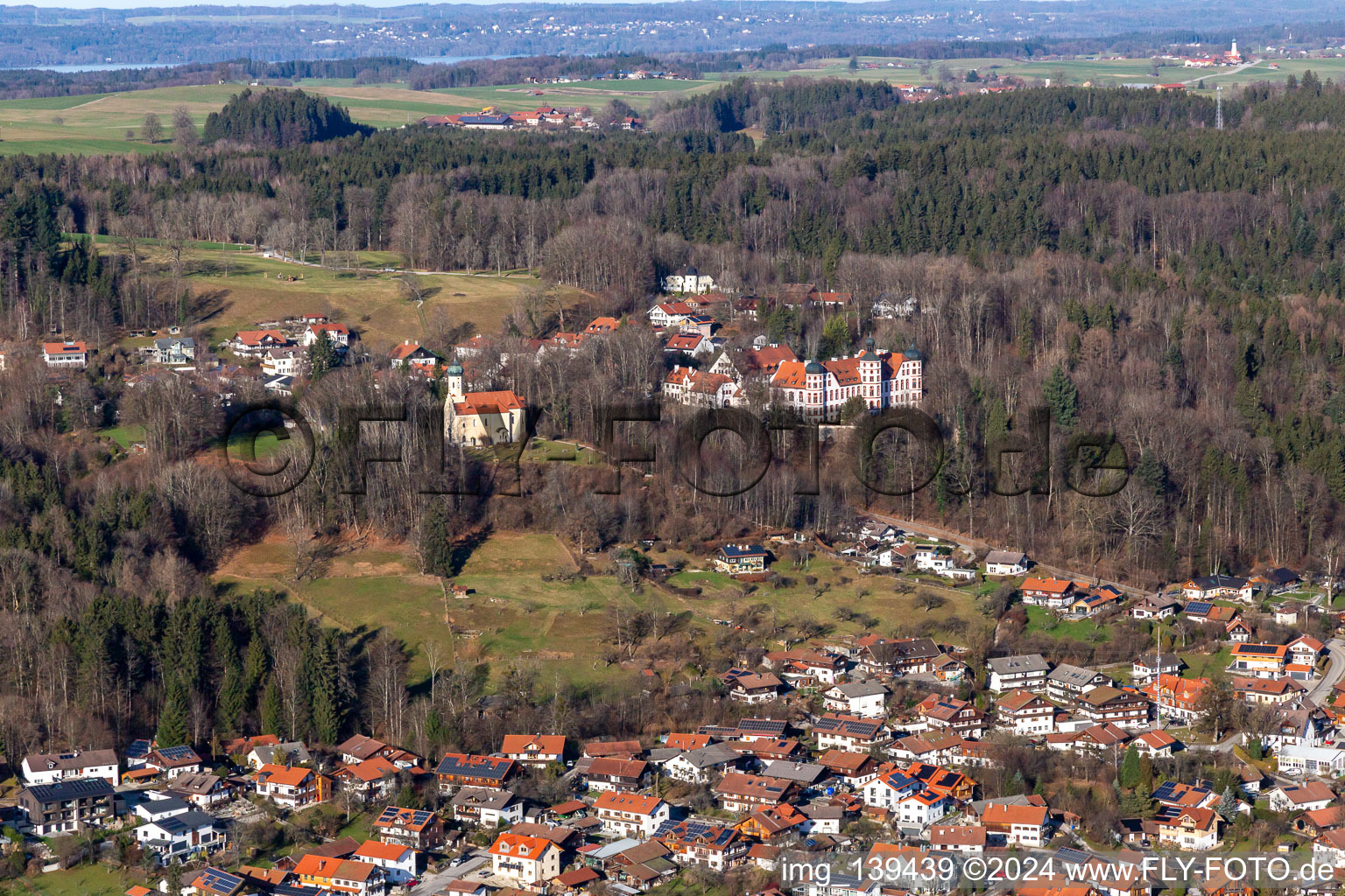 Castle and Chapel of the Immaculate Conception in Eurasburg in the state Bavaria, Germany from above