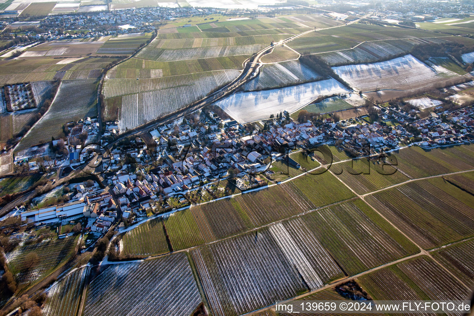 Aerial view of From the northeast in winter when there is snow in Niederhorbach in the state Rhineland-Palatinate, Germany