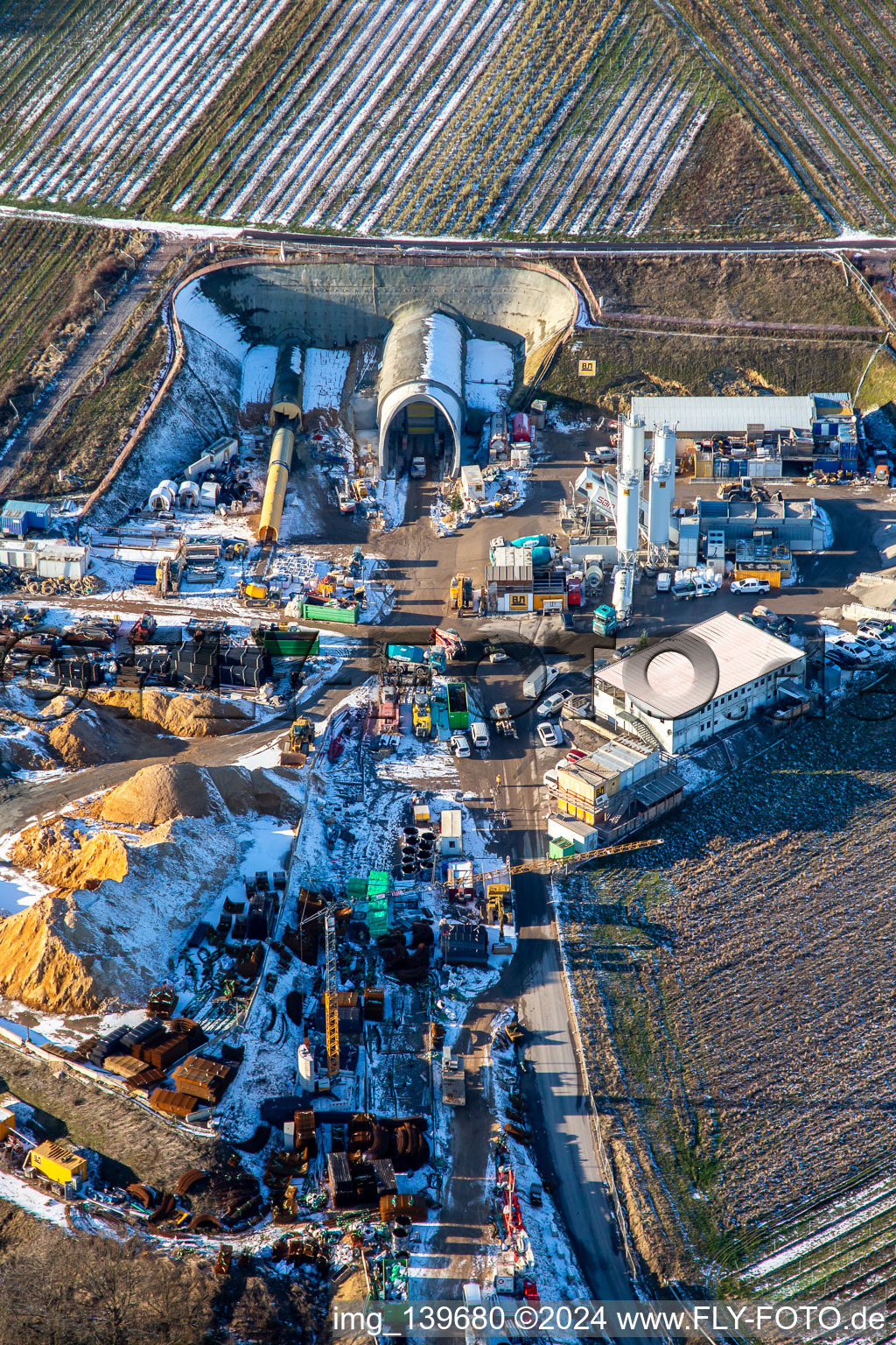 Oblique view of Tunnel construction site in winter with snow in Dörrenbach in the state Rhineland-Palatinate, Germany