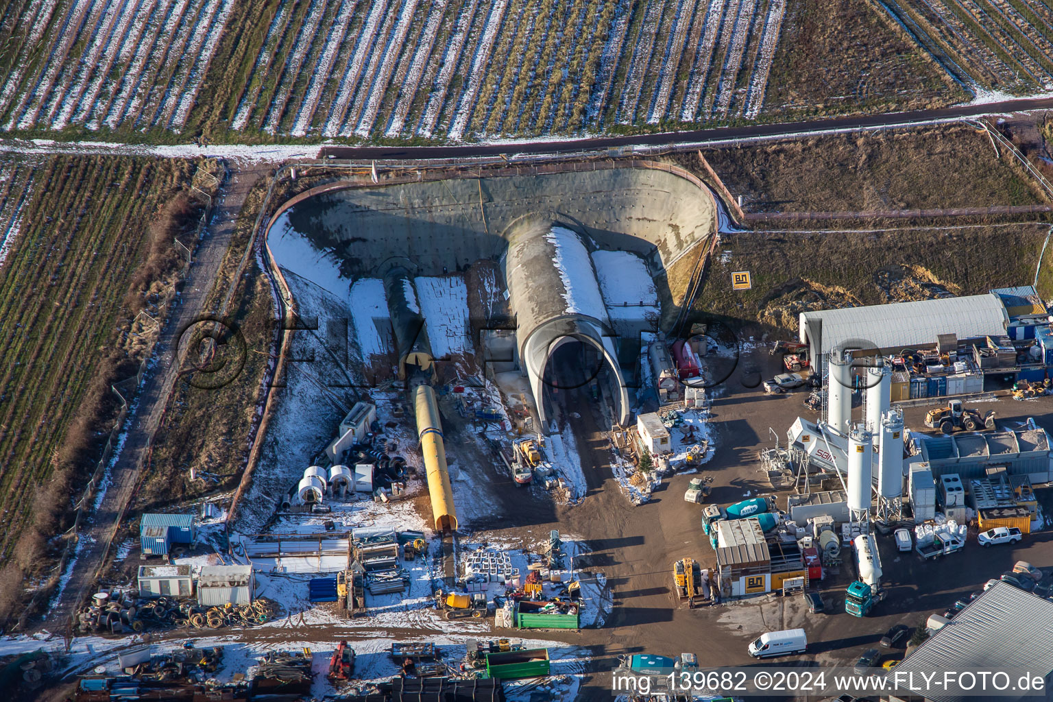 Tunnel construction site in winter with snow in Dörrenbach in the state Rhineland-Palatinate, Germany from above