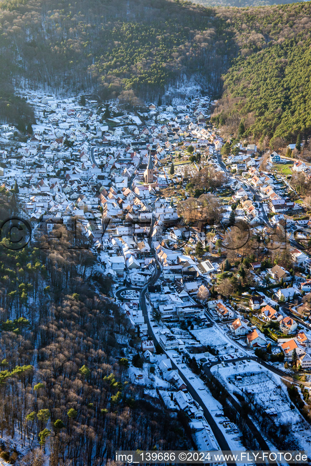 Oblique view of The Sleeping Beauty of the Palatinate in winter with snow in Dörrenbach in the state Rhineland-Palatinate, Germany