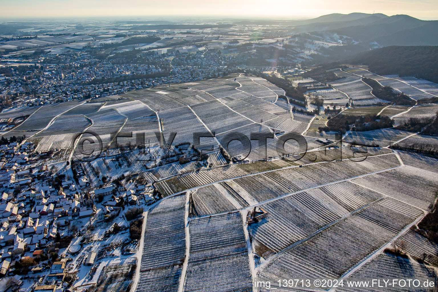 German vineyard Sonnenberg on French soil in winter with snow from the north in Wissembourg in the state Bas-Rhin, France