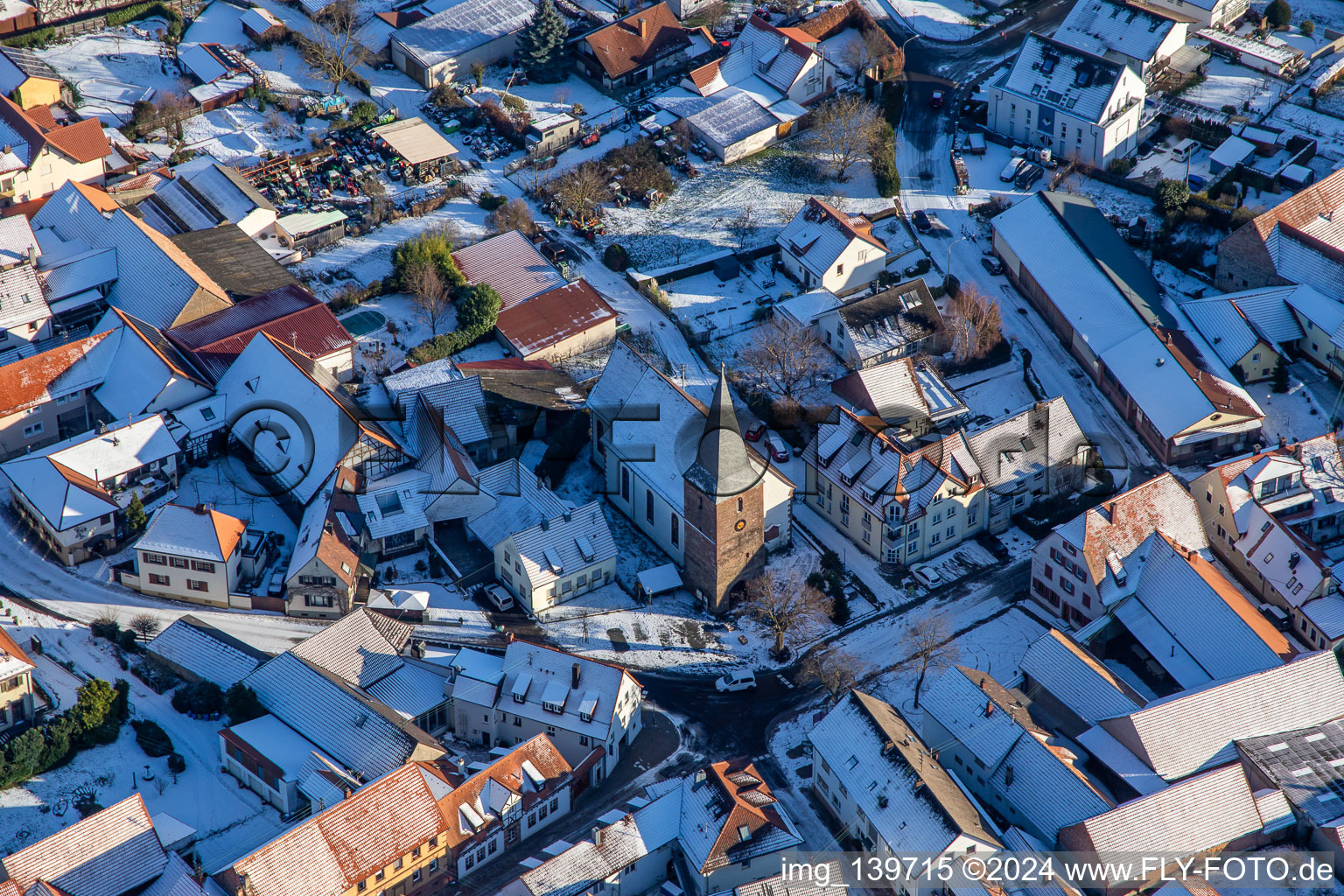 Protestant church in winter with snow in the district Schweigen in Schweigen-Rechtenbach in the state Rhineland-Palatinate, Germany