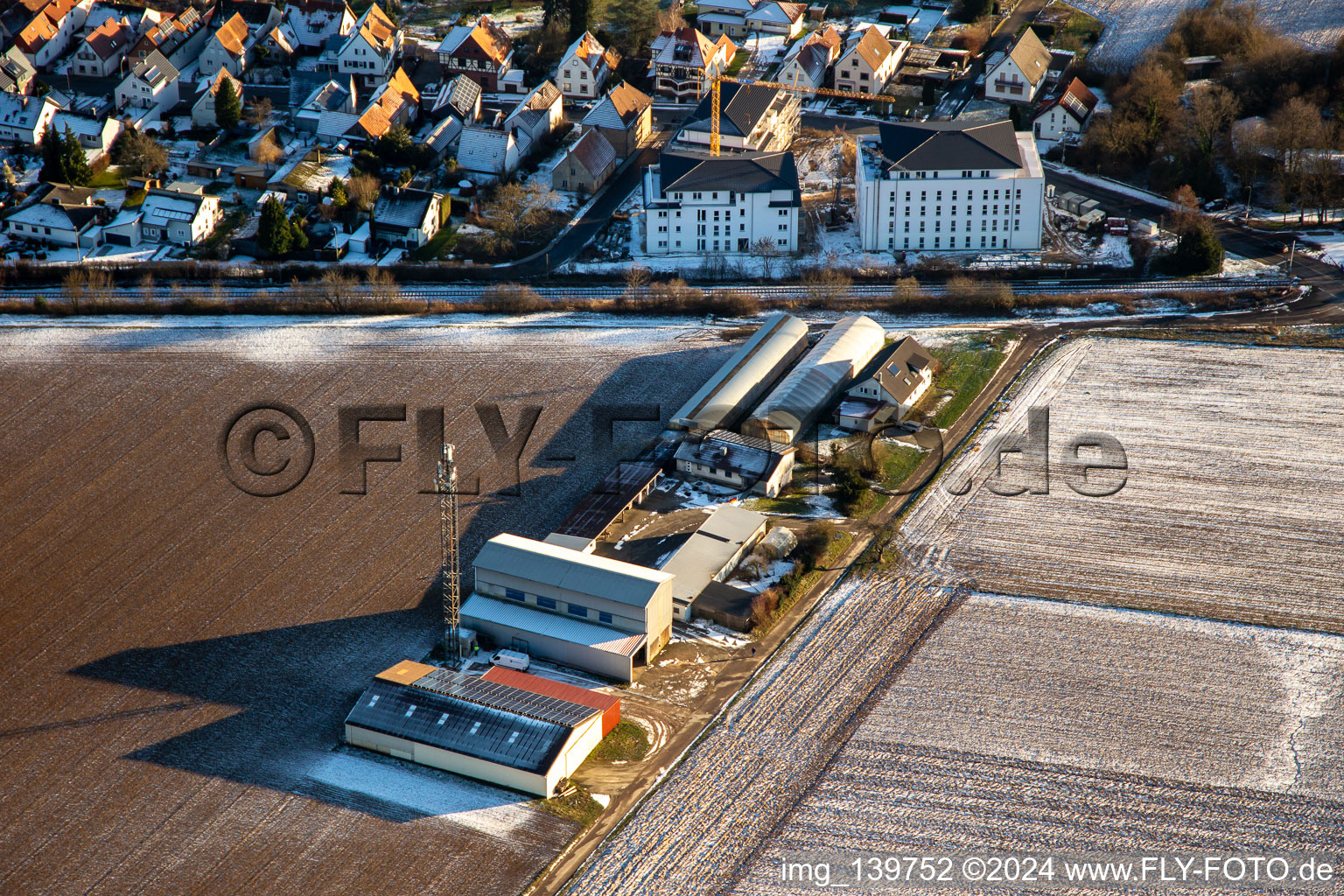 New building at the railway crossing in the district Schaidt in Wörth am Rhein in the state Rhineland-Palatinate, Germany