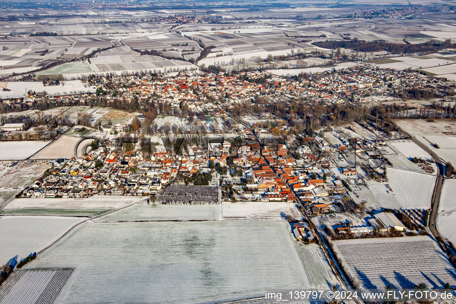 Aerial view of From the south in winter in the snow in the district Mühlhofen in Billigheim-Ingenheim in the state Rhineland-Palatinate, Germany