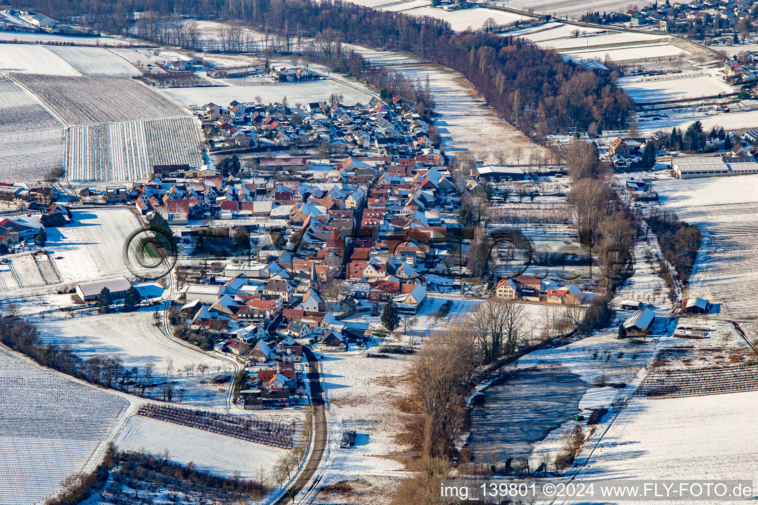 From the east in winter in the snow in the district Klingen in Heuchelheim-Klingen in the state Rhineland-Palatinate, Germany