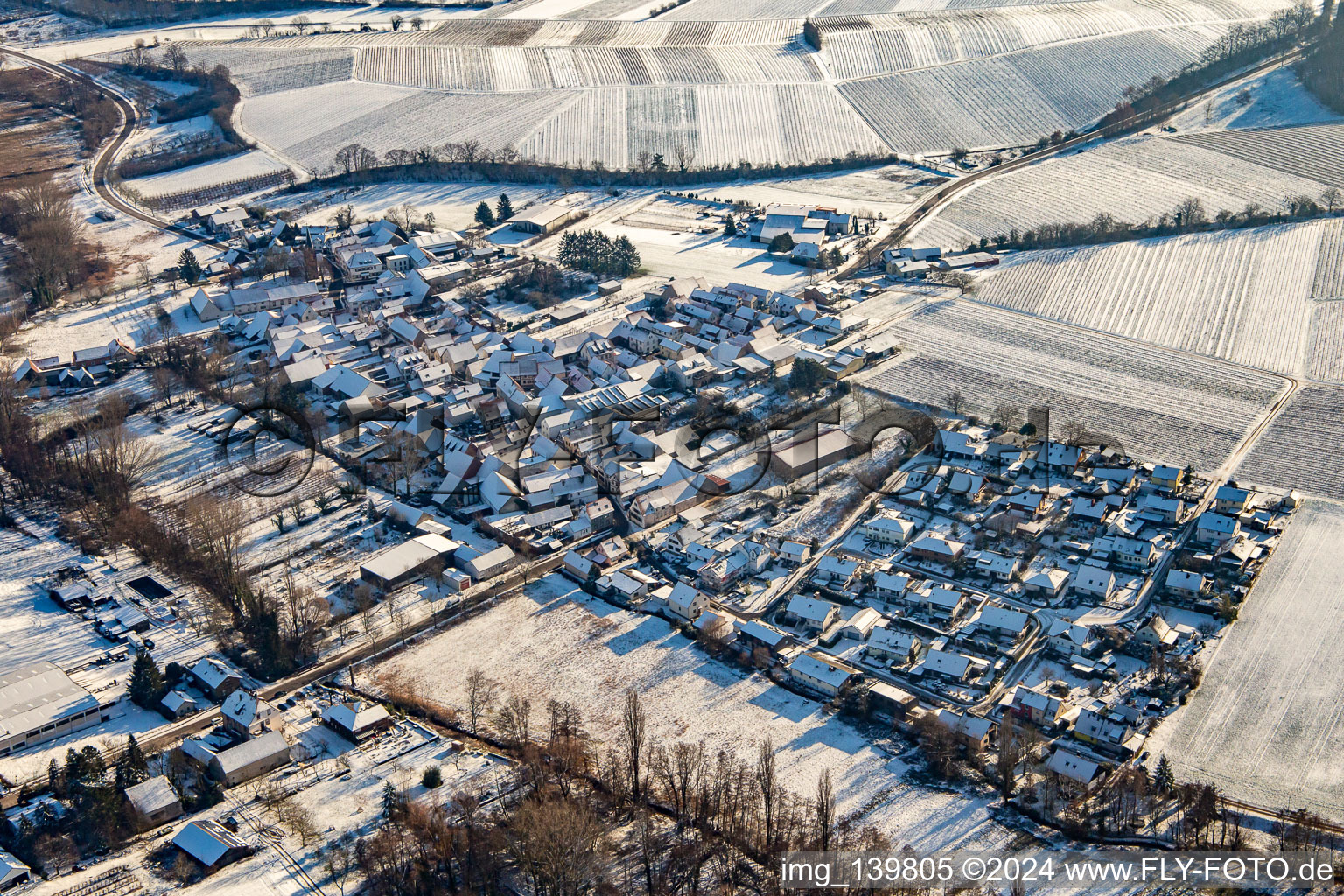 From the northwest in winter in snow in the district Klingen in Heuchelheim-Klingen in the state Rhineland-Palatinate, Germany