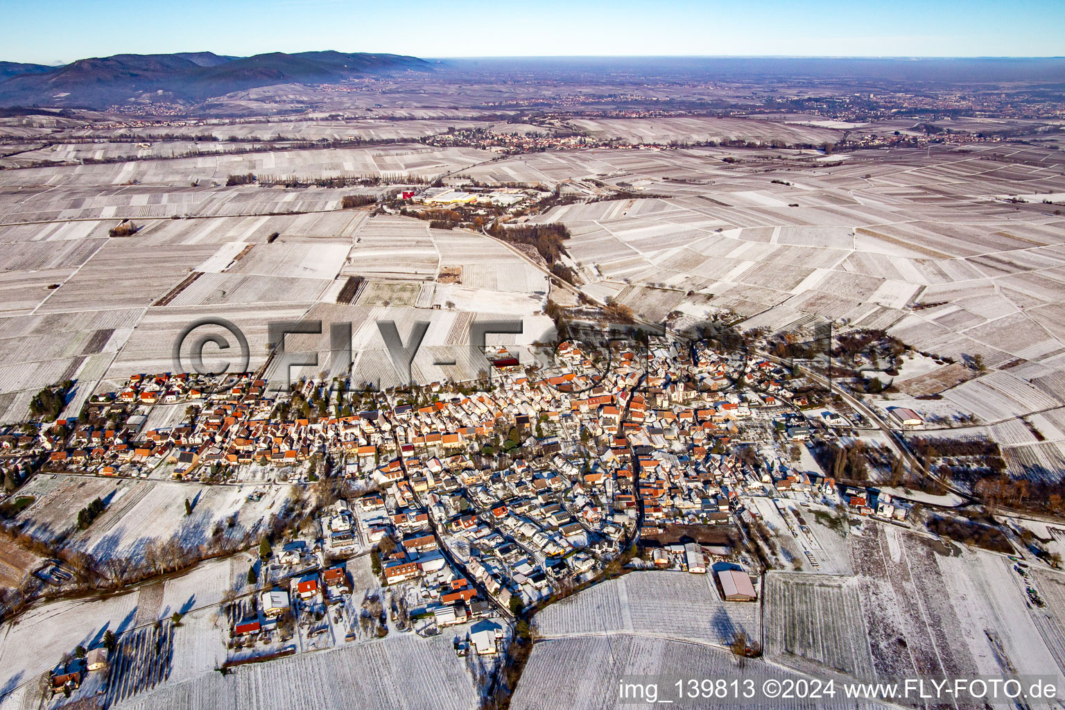 Aerial view of From the south in winter in the snow in Göcklingen in the state Rhineland-Palatinate, Germany