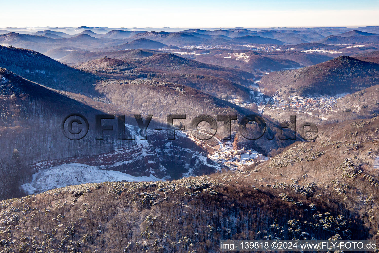 Palatinate granite in winter with snow in Waldhambach in the state Rhineland-Palatinate, Germany