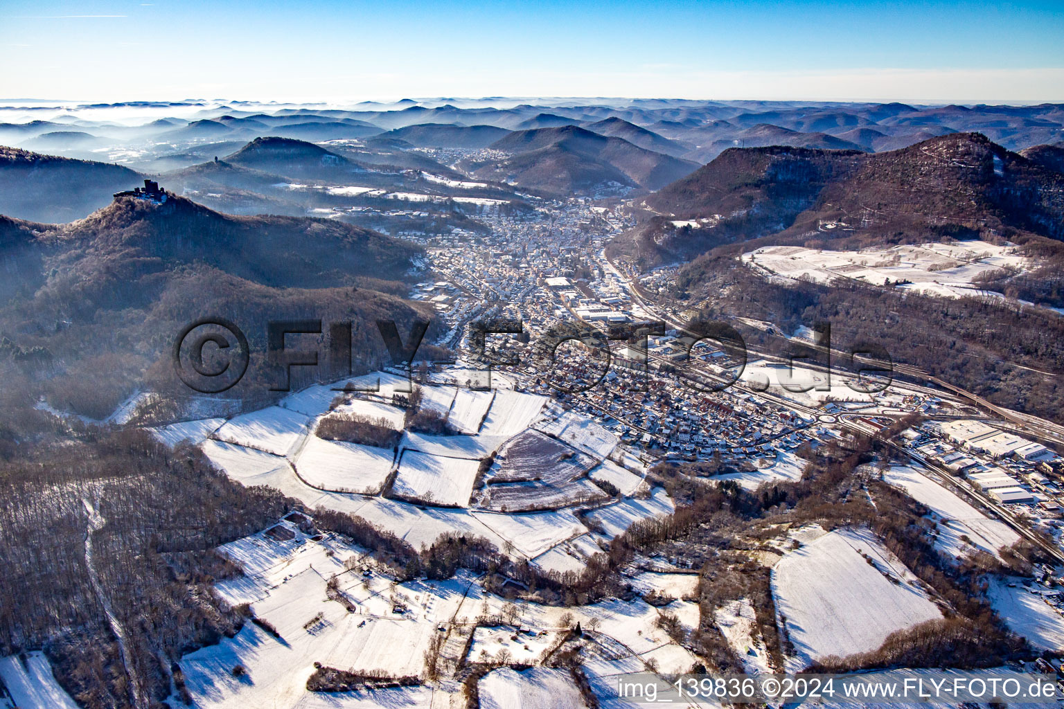 Queichtal from the east in winter with snow in Annweiler am Trifels in the state Rhineland-Palatinate, Germany