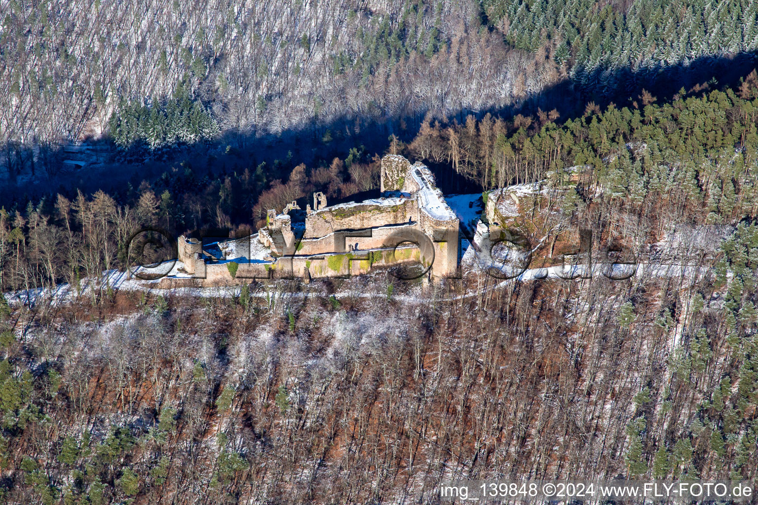 Aerial photograpy of Neuscharfeneck castle ruins from the south in winter with snow in Flemlingen in the state Rhineland-Palatinate, Germany