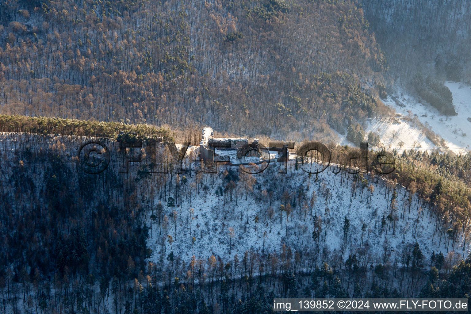 Neuscharfeneck castle ruins from the north in winter with snow in Flemlingen in the state Rhineland-Palatinate, Germany