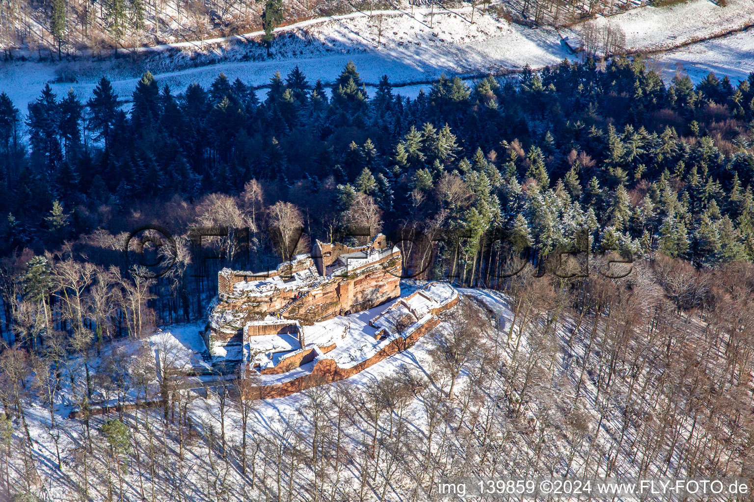 Meisteresel Castle from the south in winter with snow in Ramberg in the state Rhineland-Palatinate, Germany