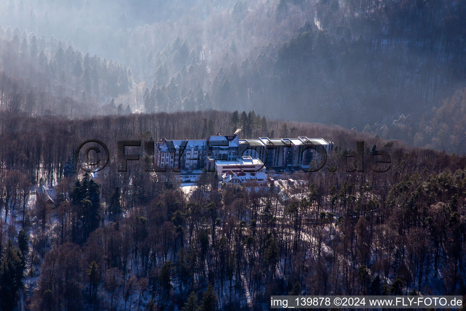 Specialist clinic Eußerthal from the north in winter with snow in Eußerthal in the state Rhineland-Palatinate, Germany