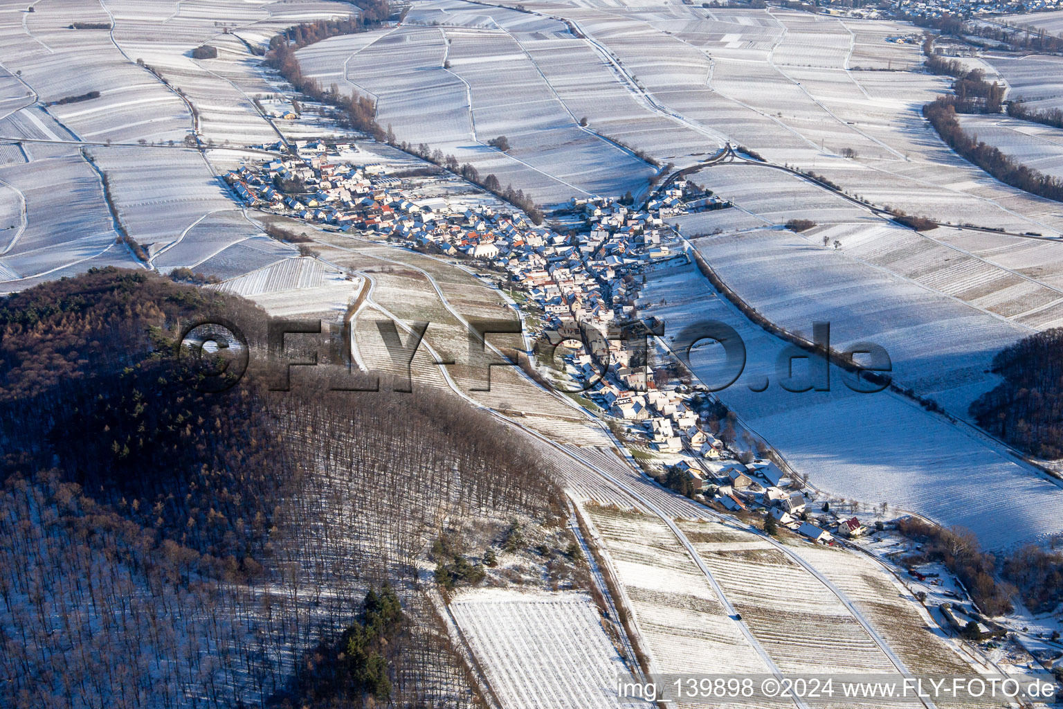 From the west in winter when there is snow in Ranschbach in the state Rhineland-Palatinate, Germany