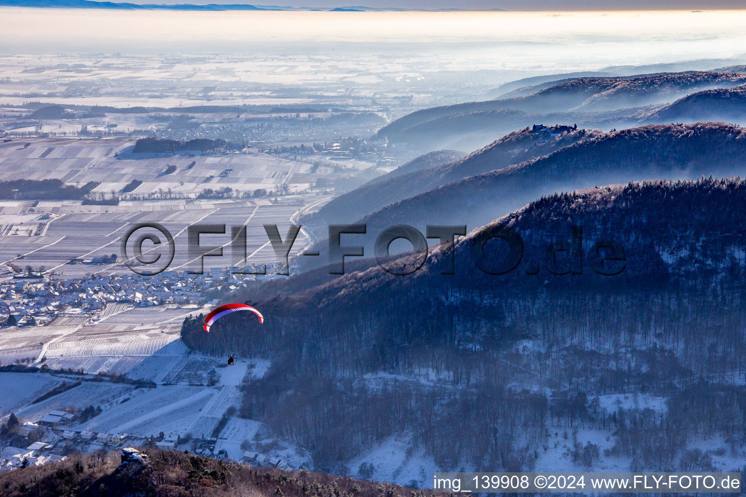 Paragliding over Neukastel castle ruins in Leinsweiler in the state Rhineland-Palatinate, Germany