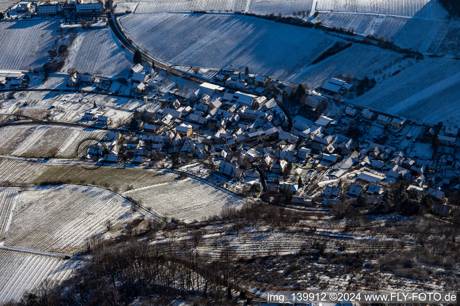 From the north in winter with snow in Leinsweiler in the state Rhineland-Palatinate, Germany