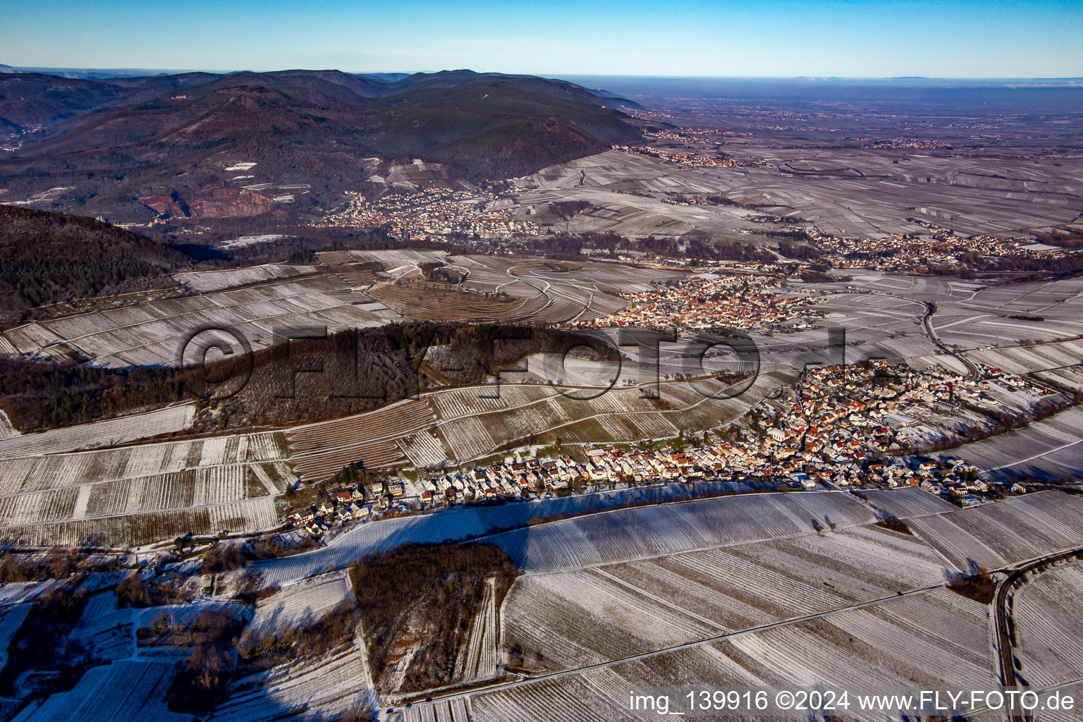 Mandelhein behind Ranschbach from the south in winter in Birkweiler in the state Rhineland-Palatinate, Germany