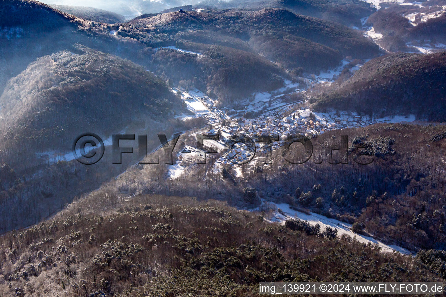 From the northeast in winter when there is snow in Waldhambach in the state Rhineland-Palatinate, Germany