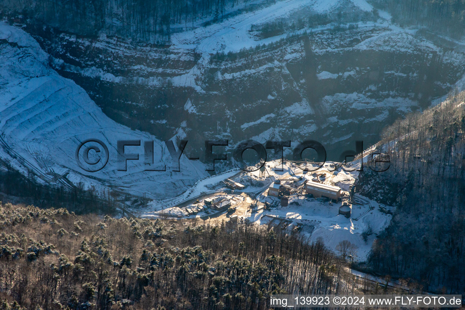 Palatinate granite from the north in winter with snow in Waldhambach in the state Rhineland-Palatinate, Germany