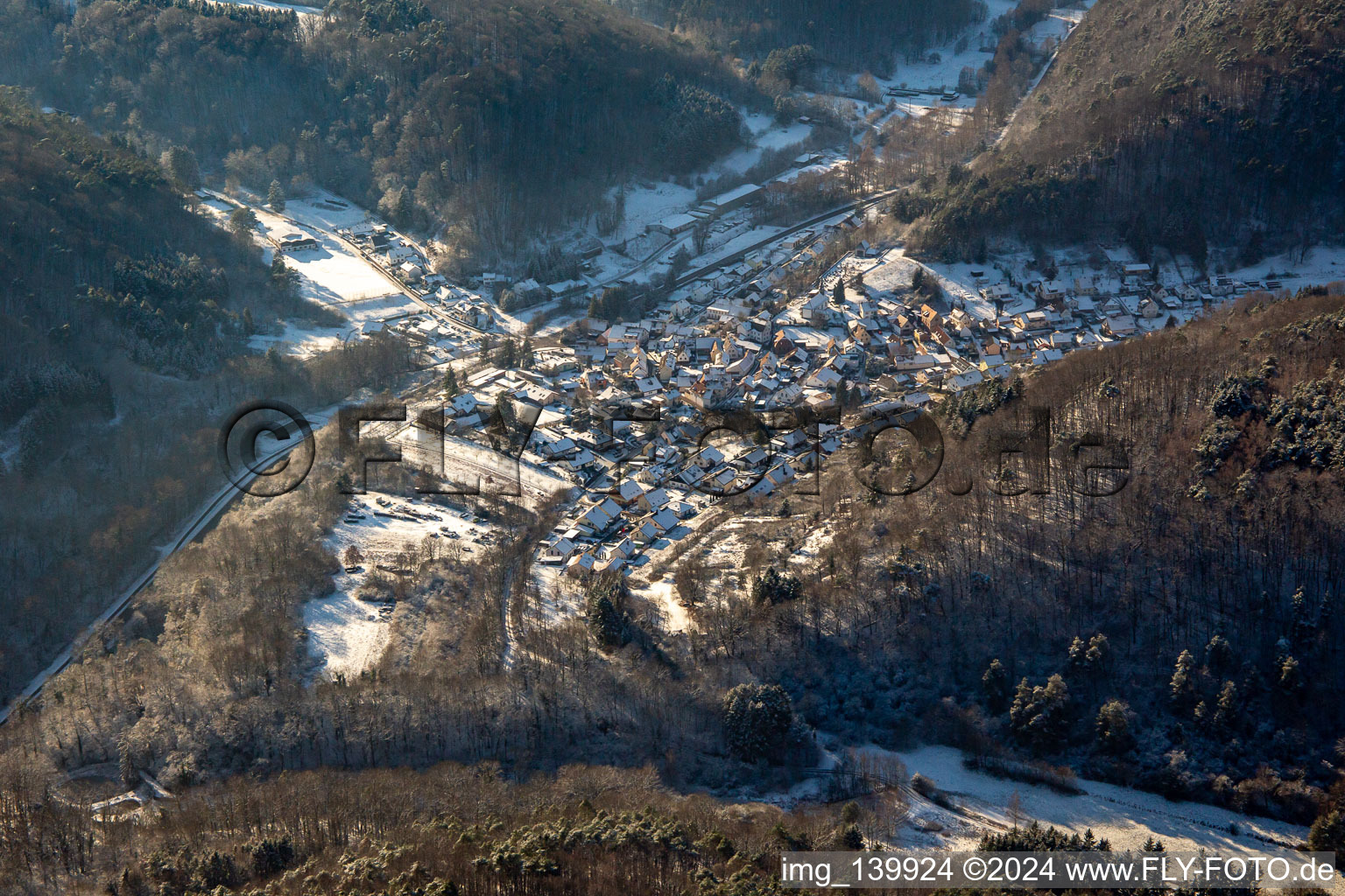 Aerial view of From the northeast in winter when there is snow in Waldhambach in the state Rhineland-Palatinate, Germany