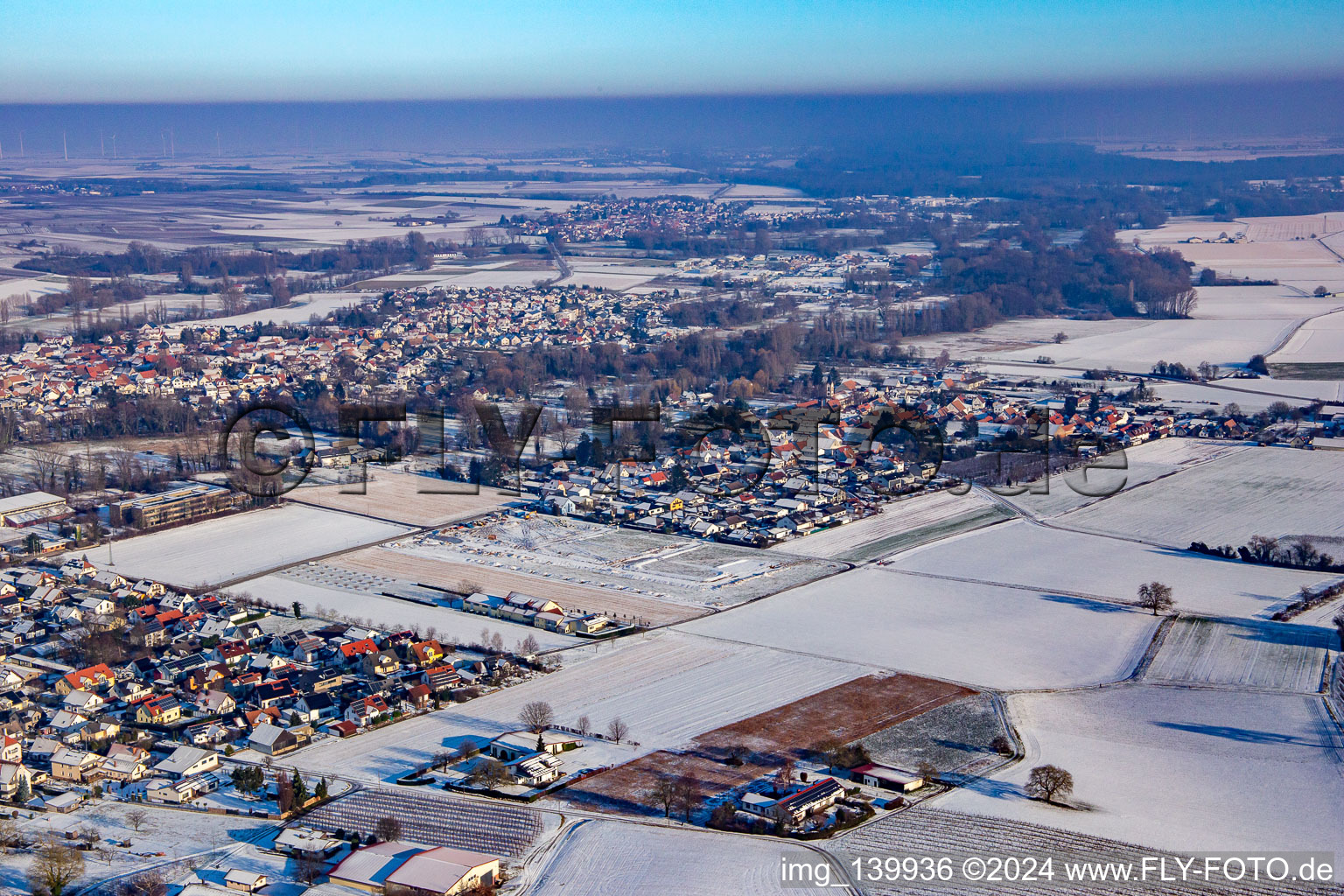 From the southwest in snow in the district Mühlhofen in Billigheim-Ingenheim in the state Rhineland-Palatinate, Germany