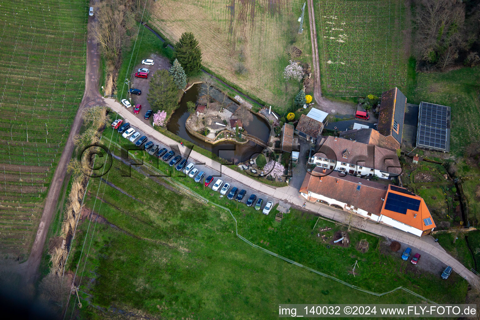 Oblique view of Country restaurant Burrweiler Mühle am Modenbach in Burrweiler in the state Rhineland-Palatinate, Germany