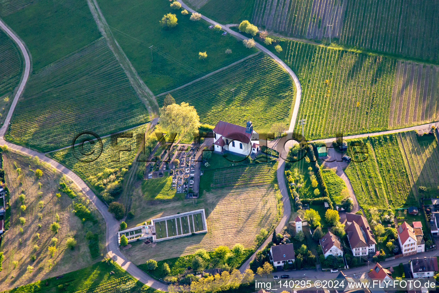 Cemetery and St. Dionysius Chapel in the evening light in the district Gleiszellen in Gleiszellen-Gleishorbach in the state Rhineland-Palatinate, Germany