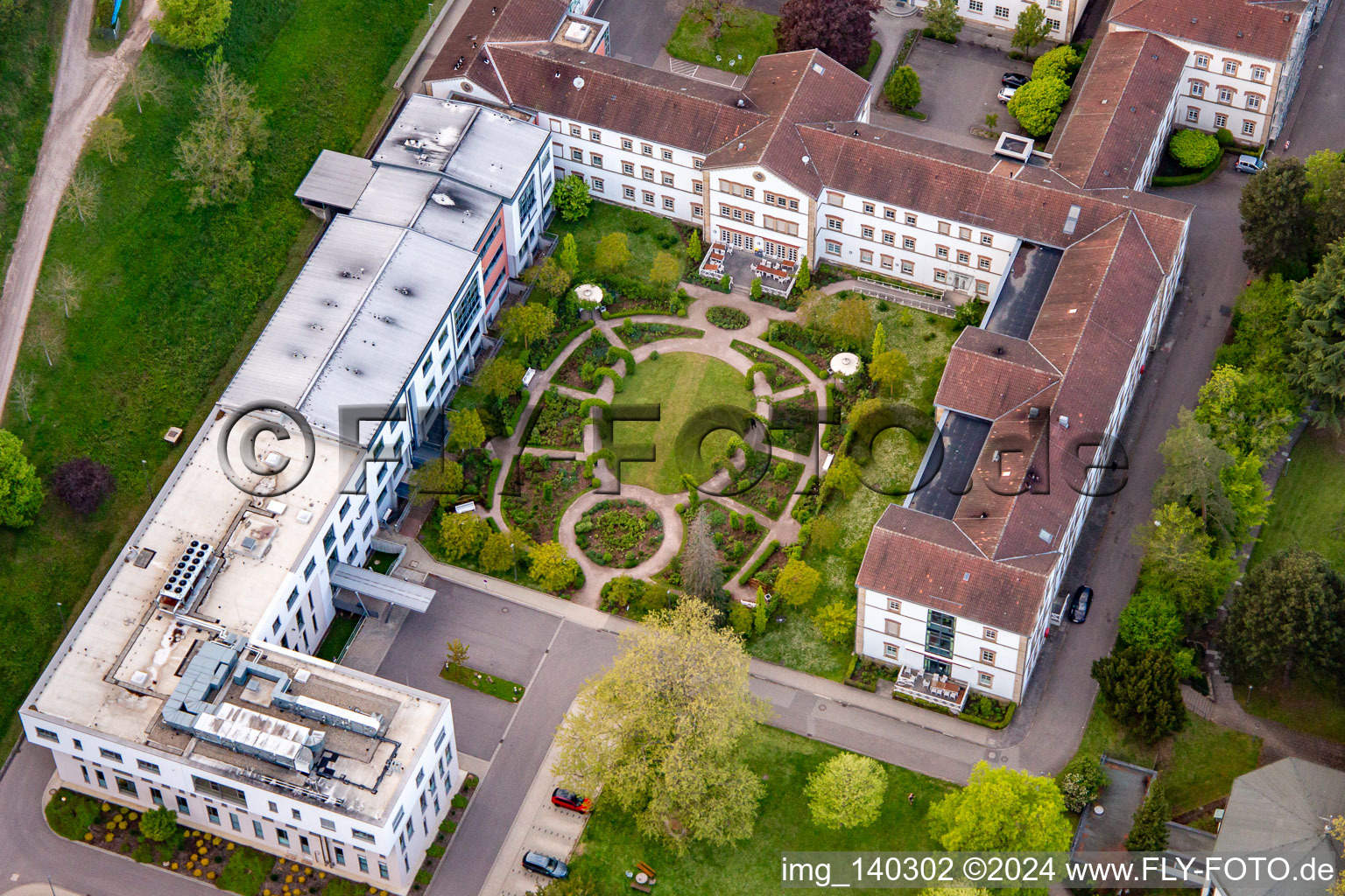 Aerial view of Palatinate Clinic for Psychiatry and Neurology "Landeck" with Department of General Psychiatry and Addiction Disorders - Clinic for Psychiatry, Psychosomatics and Psychotherapy, Clinic for Forensic Psychiatry, Clinic for Gerontopsychiatry, Psychosomatics and Psychotherapy, Clinic for Neurology, Clinic for Psychiatry, Psychosomatics and Psychotherapy, Clinic for Child and Adolescent Psychiatry, Psychosomatics and Psychotherapy as well as Institute Outpatient Clinic, Psychiatric Institute Outpatient Clinics - Clinic for Psychiatry, Psychosomatics and Psychotherapy in Klingenmünster in the state Rhineland-Palatinate, Germany