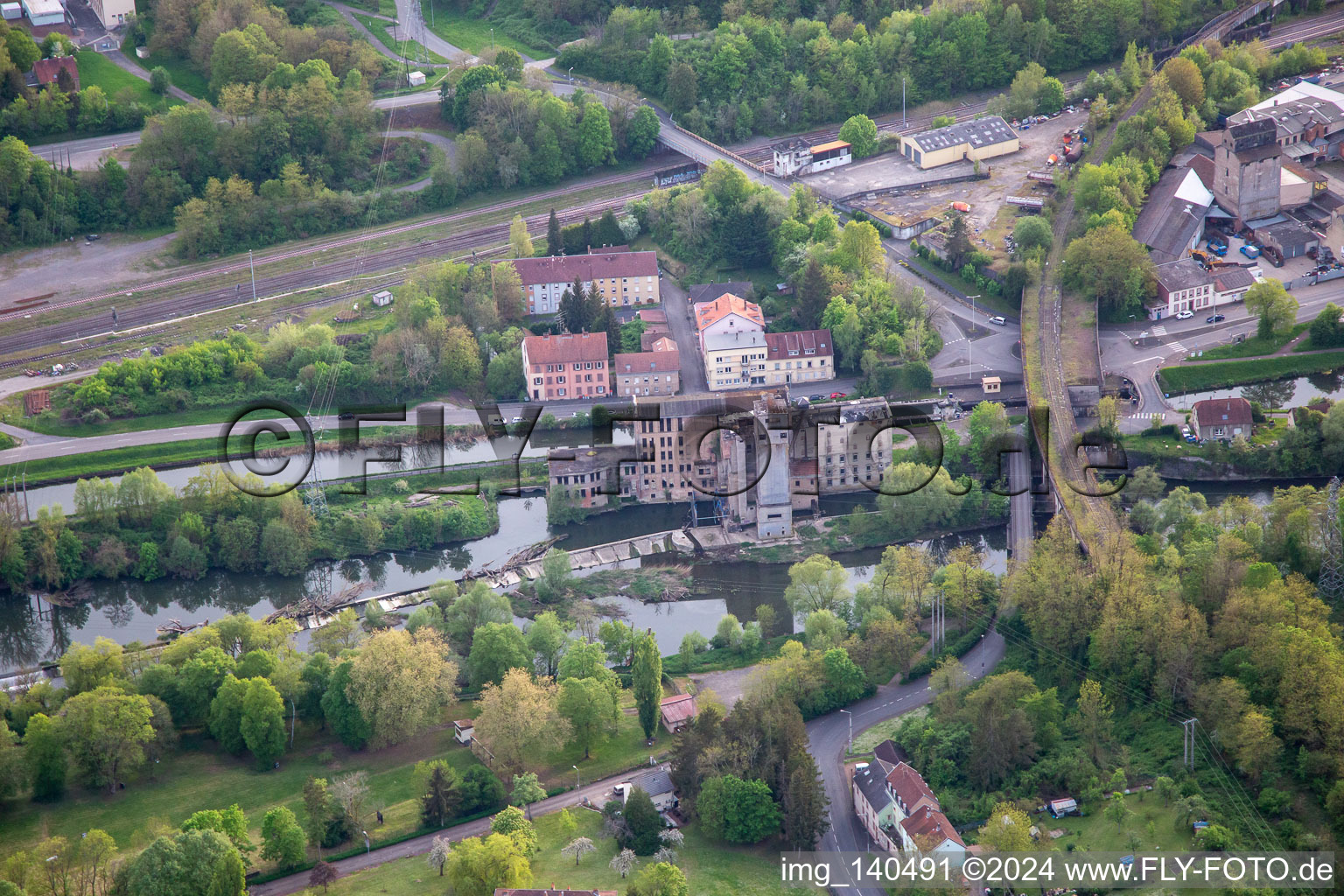 Old factory building at the Saarschleuse N 26 in Saargemünd in the state Moselle, France