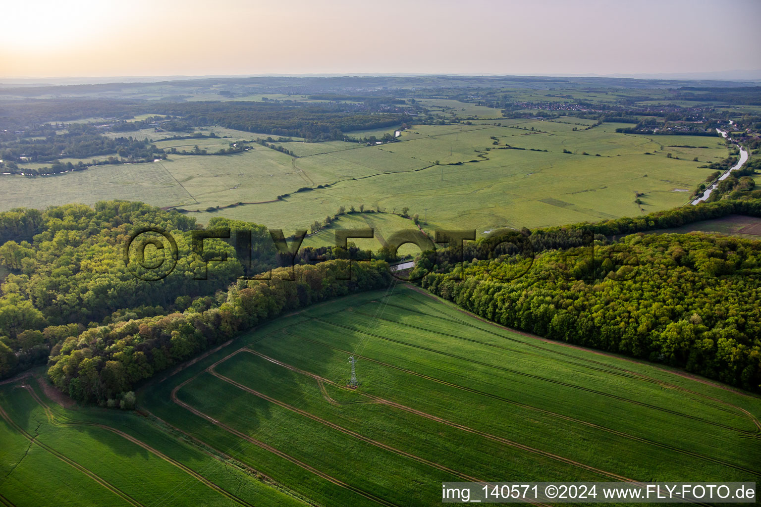 Meadows on the Mittlachgraben in the morning in Harskirchen in the state Bas-Rhin, France