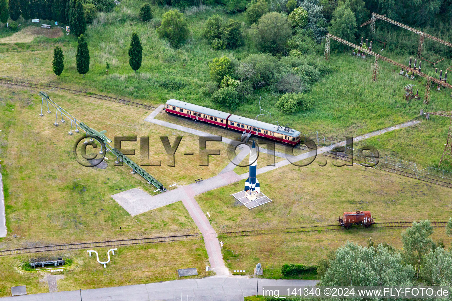 V2 rocket and Peenemünde factory railway on the outdoor grounds of the Historical-Technical Museum Peenemünde on rocket construction in World War II in the former power station in Peenemünde in the state Mecklenburg-Western Pomerania, Germany