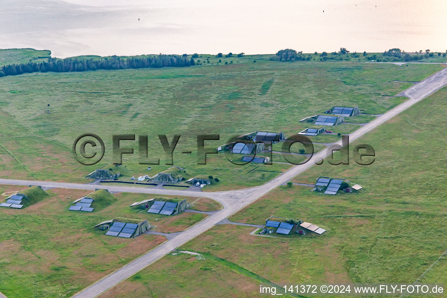 Photovoltaics on old bunkers at Peenemünde Airport in Peenemünde in the state Mecklenburg-Western Pomerania, Germany