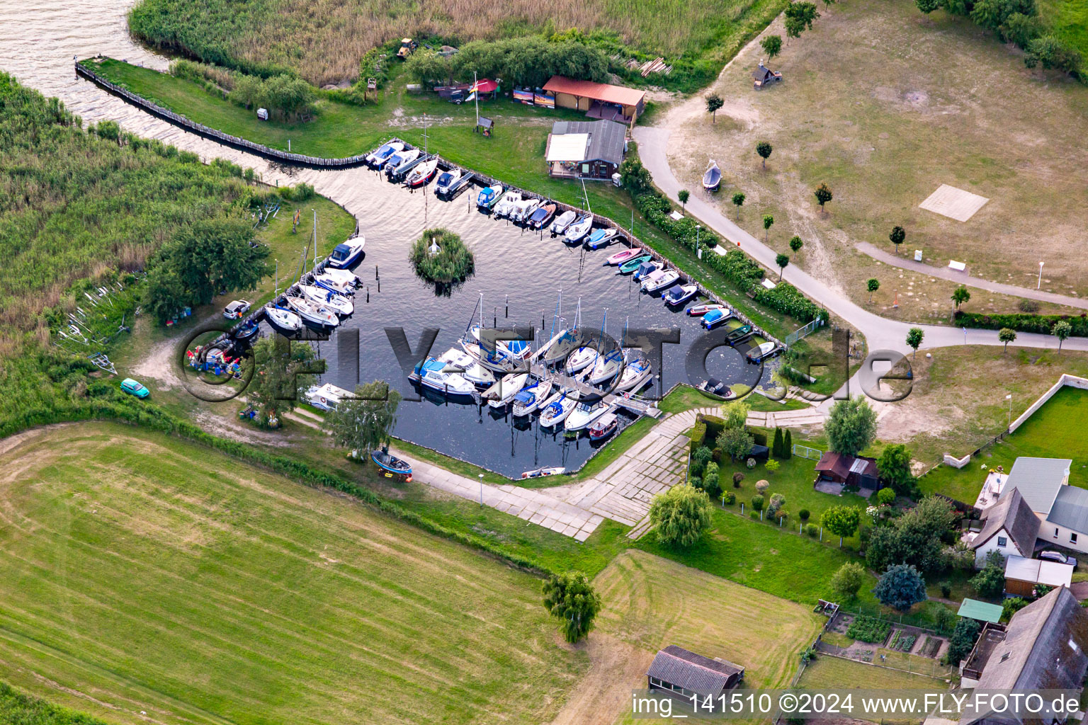 Aerial view of Yacht harbor Loddin to the Achterwasser in Loddin in the state Mecklenburg-Western Pomerania, Germany