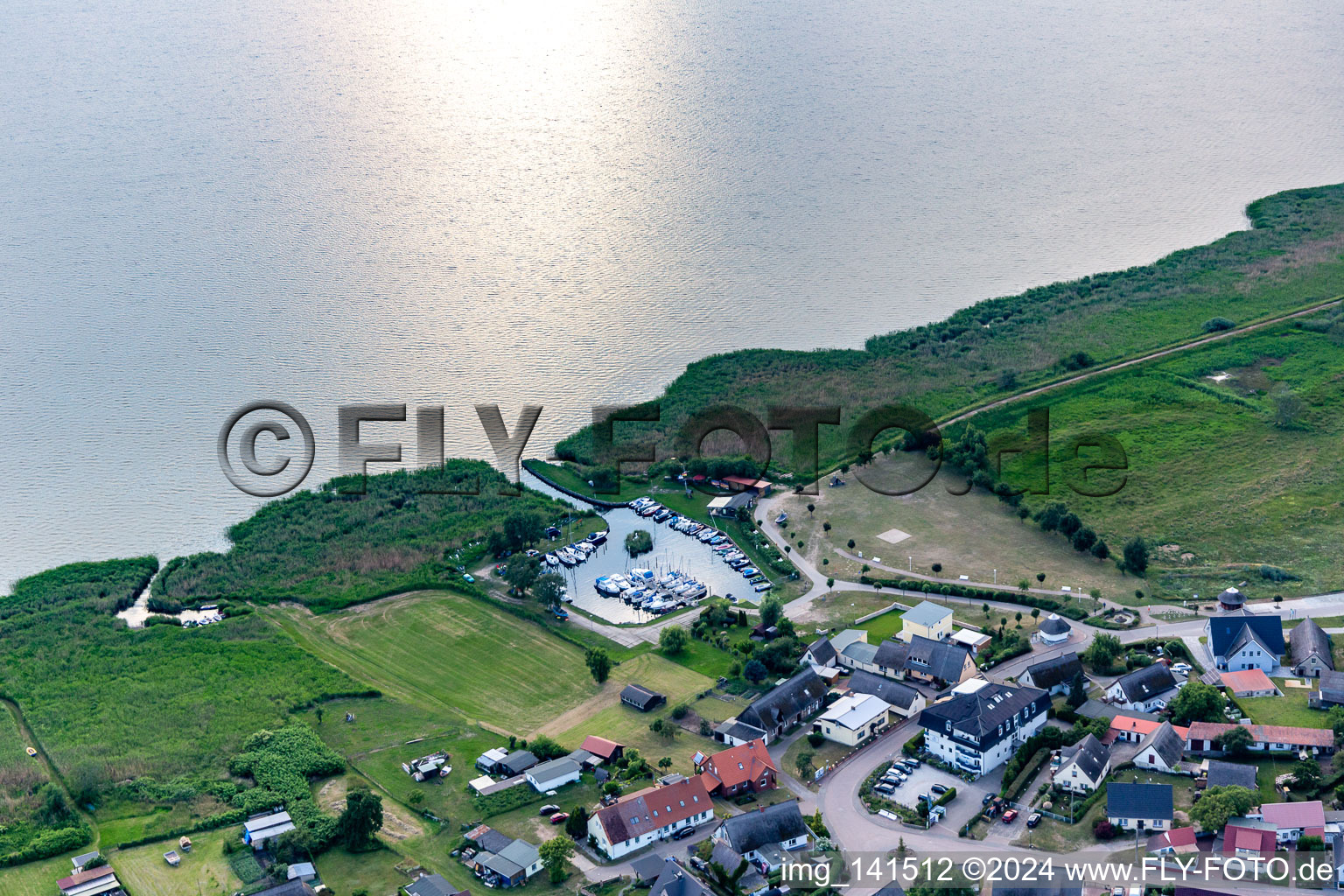 Oblique view of Yacht harbor Loddin to the Achterwasser in Loddin in the state Mecklenburg-Western Pomerania, Germany