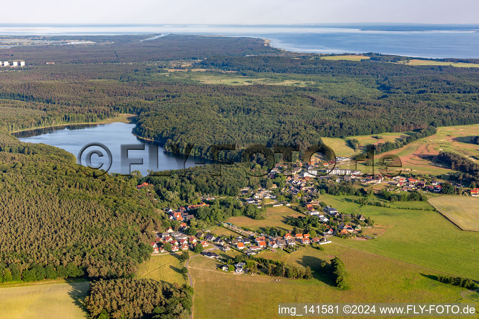 Village in front of Lake Wolgast in Korswandt in the state Mecklenburg-Western Pomerania, Germany