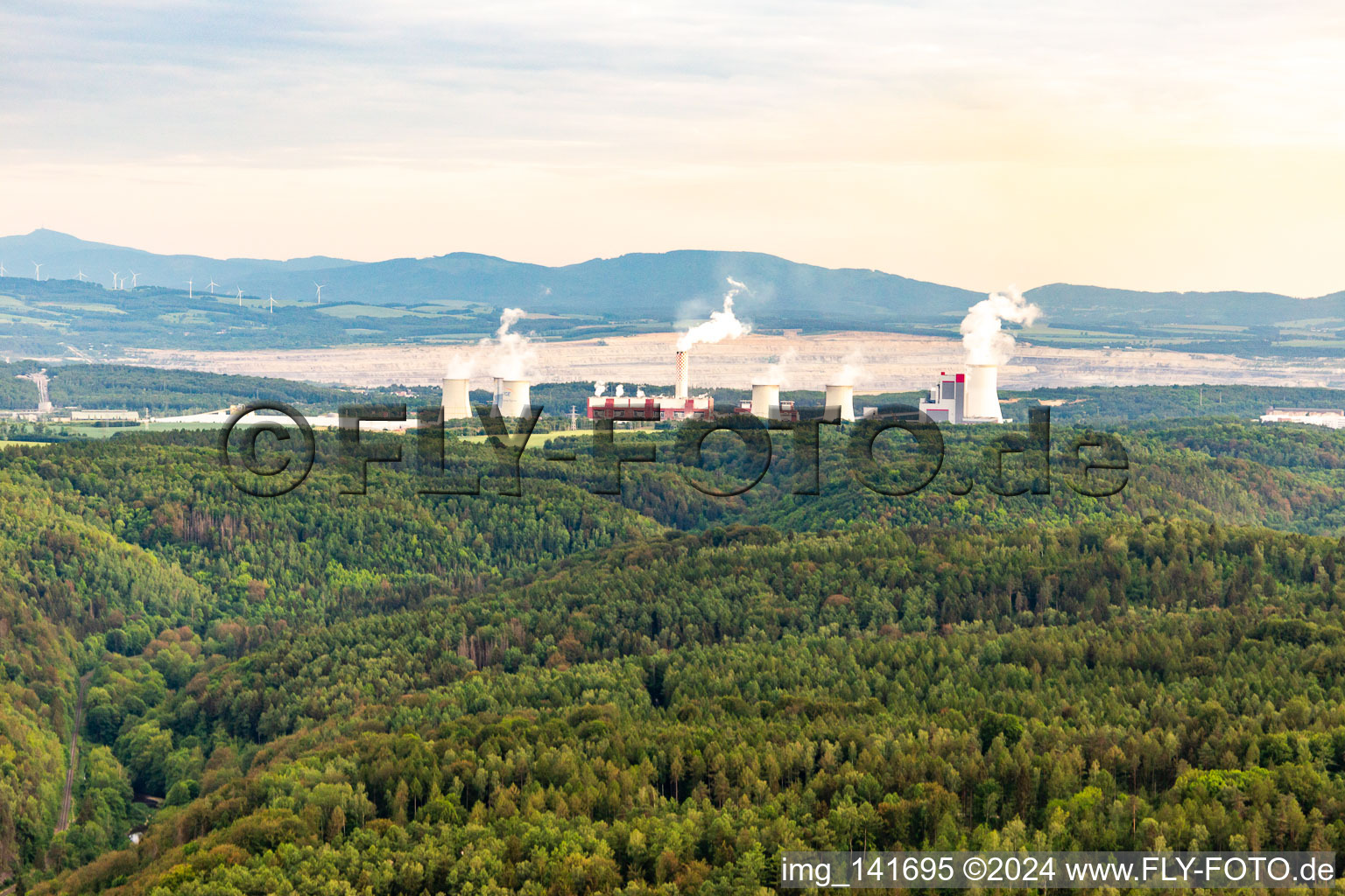 Opencast brown coal mine "PGE Górnictwo i Energetyka Konwencjonalna Oddział Kopalnia Węgla Brunatnego Turów" and Turów power plant from the north in Bogatynia in the state Lower Silesia, Poland