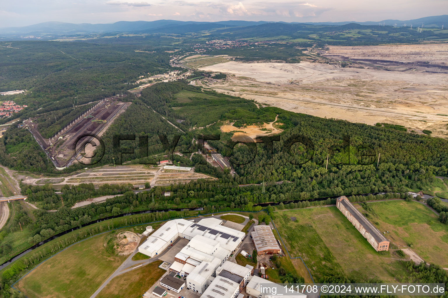 Aerial view of Coal dumps at the open-cast lignite mine "PGE Górnictwo i Energetyka Konwencjonalna Oddział Kopalnia Węgla Brunatnego Turów in Bogatynia in the state Lower Silesia, Poland