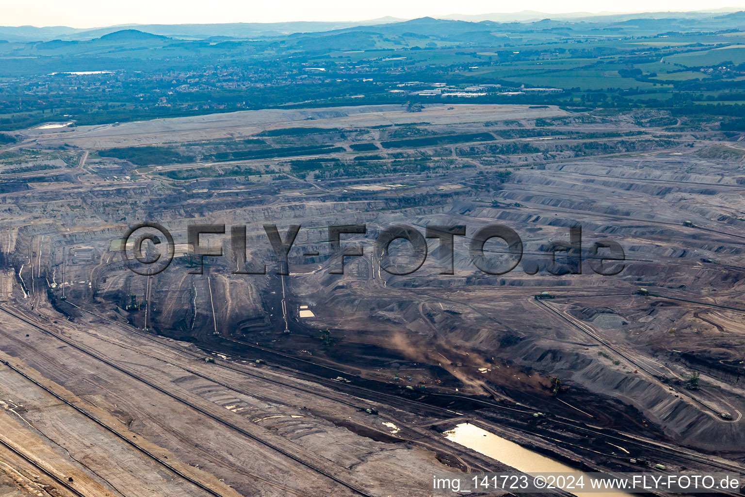 Aerial view of Opencast brown coal mine "PGE Górnictwo i Energetyka Konwencjonalna Oddział Kopalnia Węgla Brunatnego Turów in Białopole in the state Lower Silesia, Poland