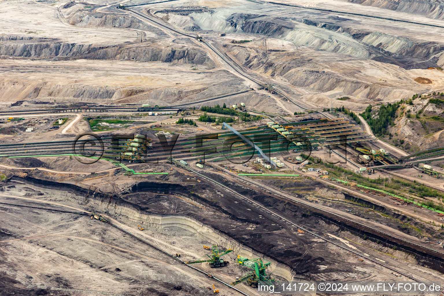 Aerial view of Conveyor belts in the opencast brown coal mine "PGE Górnictwo i Energetyka Konwencjonalna Oddział Kopalnia Węgla Brunatnego Turów in Opolno-Zdrój in the state Lower Silesia, Poland