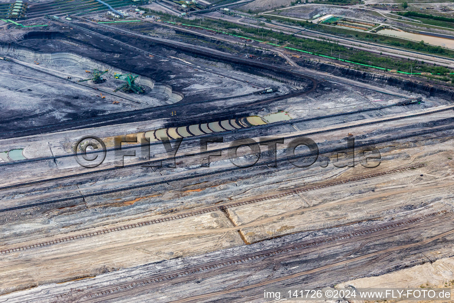 Aerial view of Opencast brown coal mine "PGE Górnictwo i Energetyka Konwencjonalna Oddział Kopalnia Węgla Brunatnego Turów in Opolno-Zdrój in the state Lower Silesia, Poland