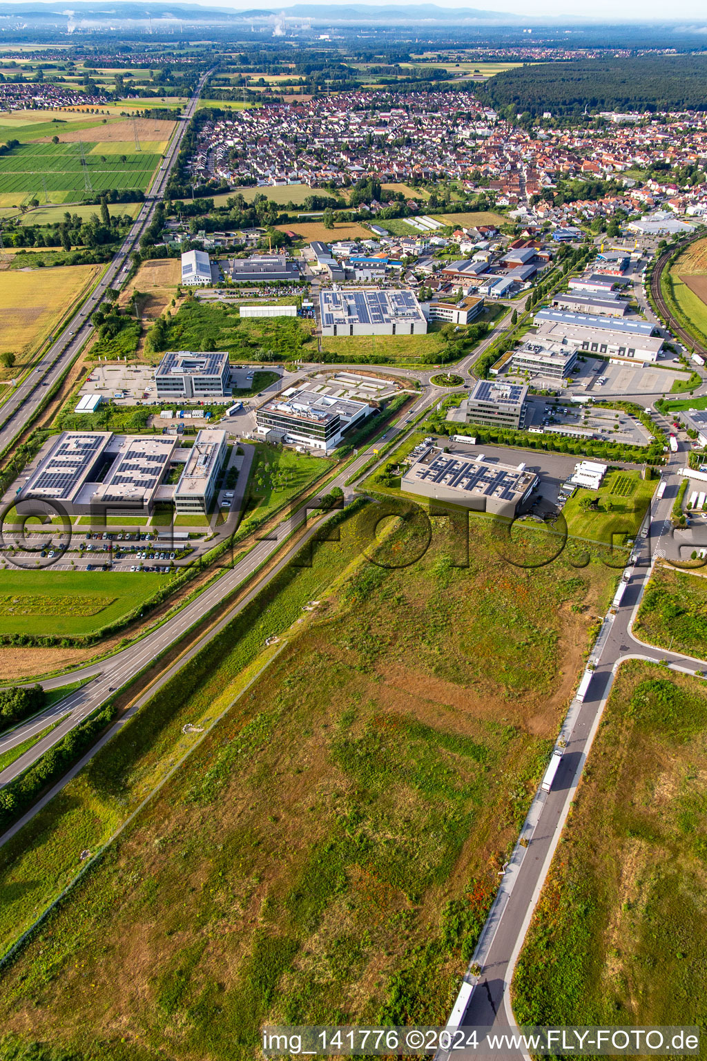 Aerial view of Development of the northern extension of the Speyer Valley commercial area in Rülzheim in the state Rhineland-Palatinate, Germany