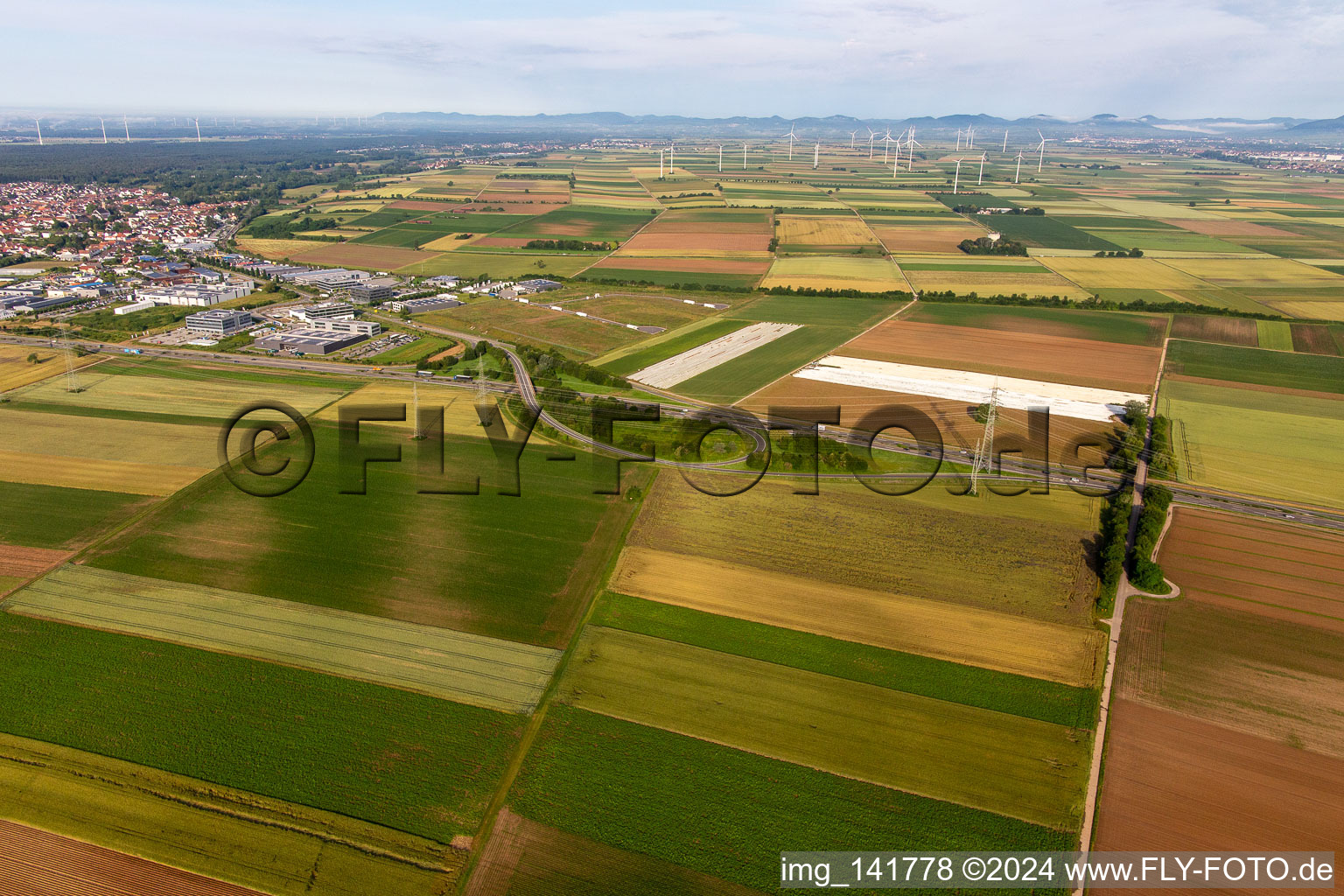 Development of the northern extension of the Speyer Valley industrial estate from the east in Rülzheim in the state Rhineland-Palatinate, Germany